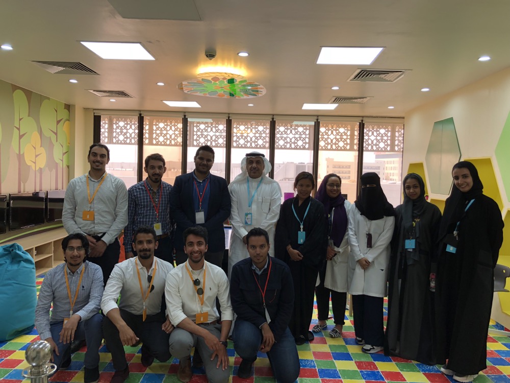 Group photo of DGS members at an outreach event